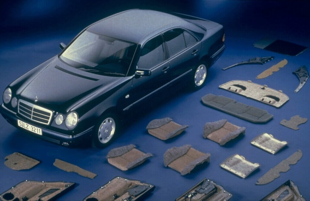 Showing a Mercedes Car and single body parts made from biocomposites