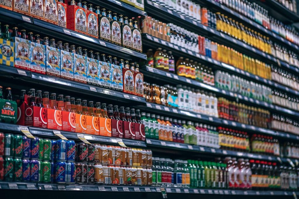 A supermarket shelf stocking beverages