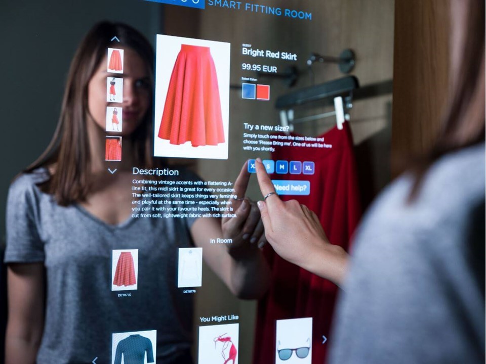 shows a woman getting product recommendations on a smart mirror